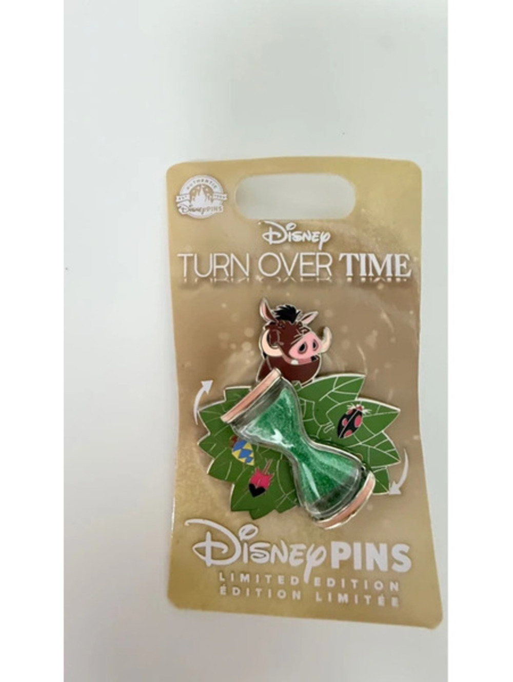 Disney Parks Turn Over Time Pumbaa Limited Edition Pin rotating green hourglass